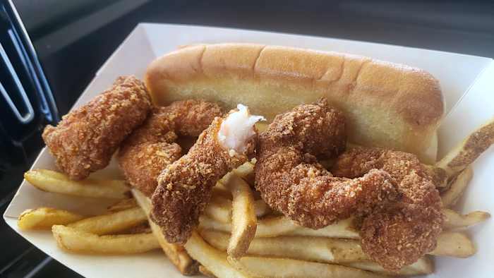 The fried shrimp meal at Angie's Lobster comes with five shrimp, fries, buttered toasted roll and a drink.